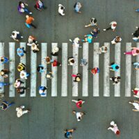 Pedestrian crossing top view. Crosswalk aerial from drone.