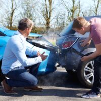 Driver Making Phone Call After Traffic Accident