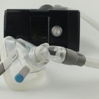 CPAP machine with adult full face mask for the treatment of sleep apnoea, isolated on a white background CPAP machine with adult full face mask for the treatment of sleep apnoea, isolated on a white background