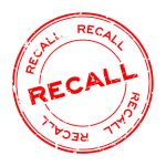 Grunge red recall round rubber seal stamp on white background
